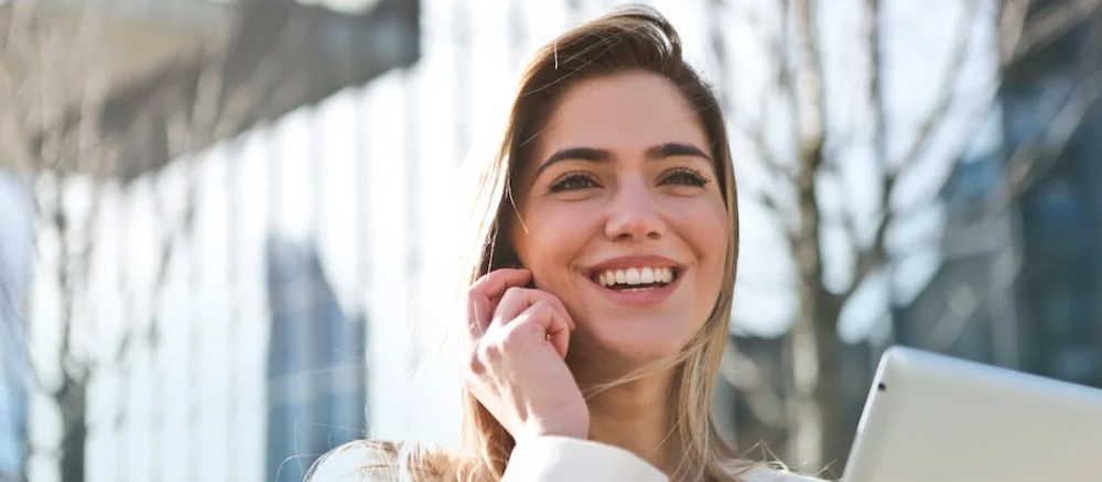Business woman overlooking skyscrapers